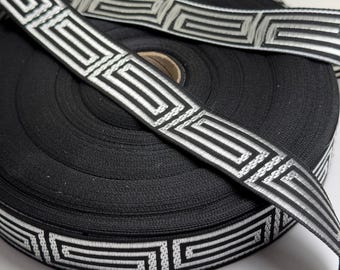 Greek key fabric trim, 1 1/8 inch wide, black and silver, sold by the yard.