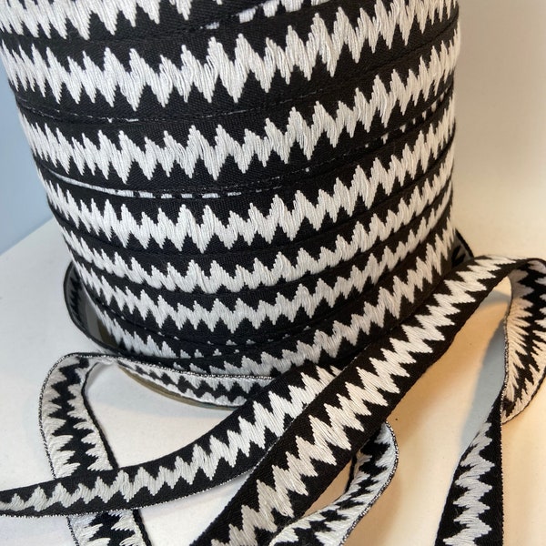 Earthquake fabric trim, black with white center, woven cotton, 3/4 inch wide, sold by the yard.