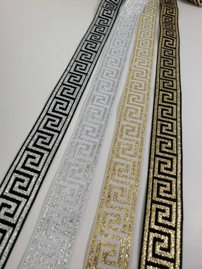 7/8 inch Greek key metallic ribbon trim, sold by the yard.