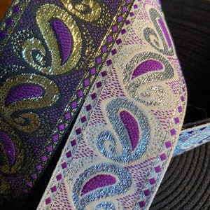 Paisley design, purple with gold or silver! So great for many projects. One and a half inch wide. jacquard Fabric trim, sold by the yard.