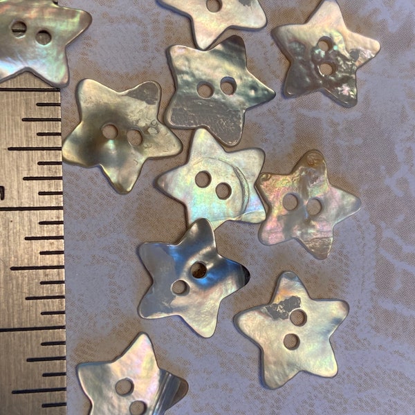 10 fragile decorative star shape mother of pearl buttons, 1/2 inch, in very good vintage or new condition. #53