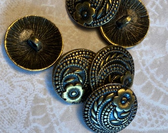 6 floral antiqued brass tone buttons, 1/2 inch wide. #502