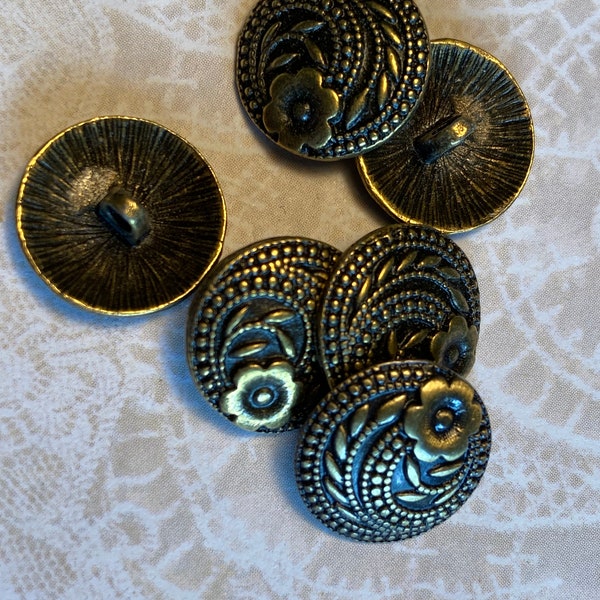 6 floral antiqued brass tone buttons, 1/2 inch wide. #502