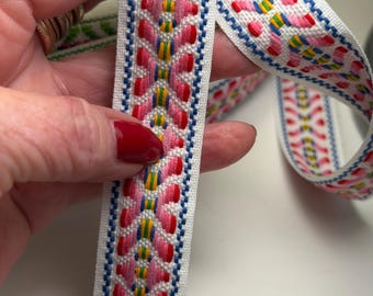Native pink x  jacquard  1 in wide fabric trim, sold by the yard.