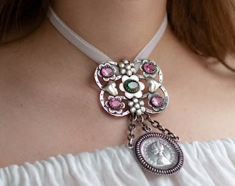 COMPLETELY HANDMADE. Traditional Ukrainian silver pendant called "dukach". Made in the ancient technique. Decorated with cubic zirconia.