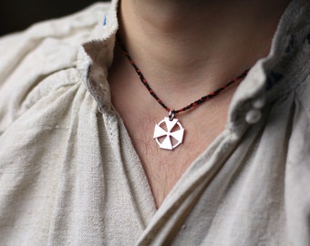 Zaporizhian type silver men's cross. Such a cross can be seen on Cossack coats of arms. Reinterpretation of the traditional cross.