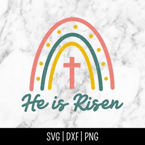May include: A colorful rainbow with a cross in the center and the text "He is Risen" below. The rainbow is made up of pink, yellow, and teal colors with white polka dots.