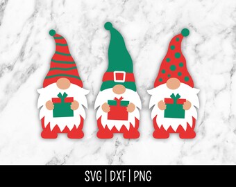 May include: Three red and white gnomes with green hats and beards holding green gift boxes. The gnomes are standing on a white marble background.