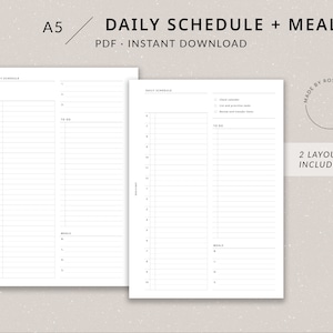 May include: Two printable A5 daily schedule and meal planner pages. The left page has a time column from 6 am to 10 pm and a to-do list. The right page has a check list for calendar, tasks, and transfer items, a to-do list, and a meal list. The text "Made by Roseandmist" and "2 Layouts Included" are in a circle on the right page. The text "#402" is at the bottom of the page.