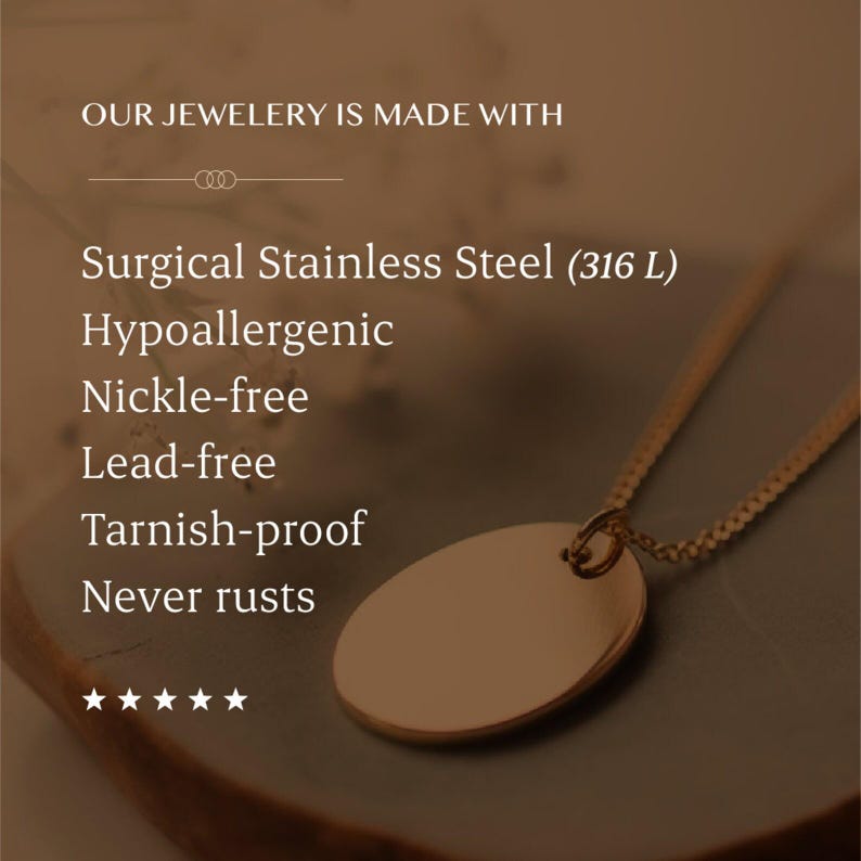 May include: A gold-toned necklace with a smooth, oval pendant on a delicate chain. The text reads: OUR JEWELERY IS MADE WITH Surgical Stainless Steel (316 L) Hypoallergenic Nickle-free Lead-free Tarnish-proof Never rusts. Five stars are displayed below.