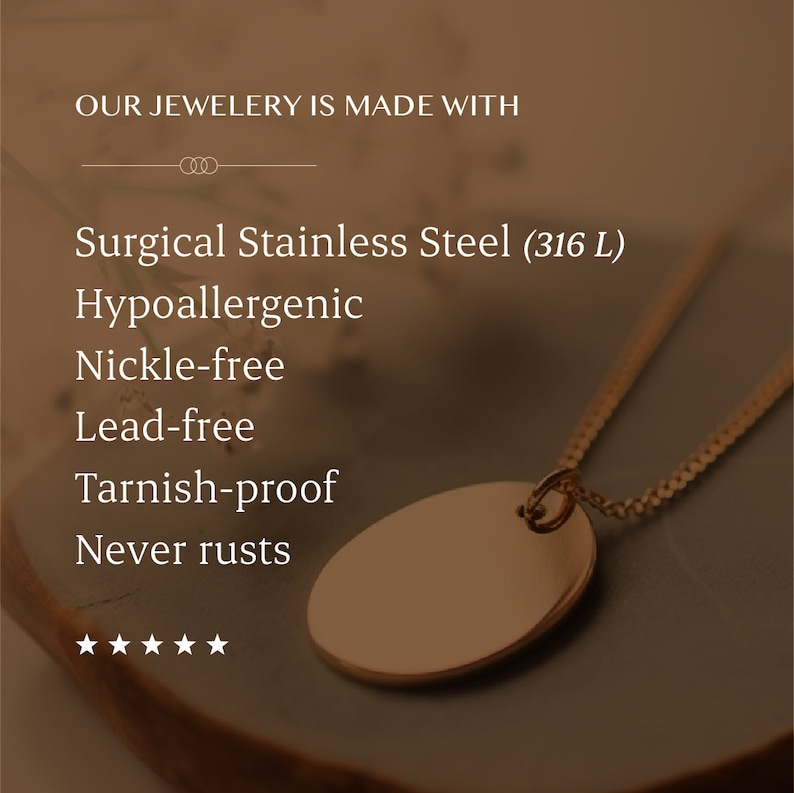 May include: A gold-toned necklace with a smooth oval pendant on a delicate chain. Text reads: OUR JEWELERY IS MADE WITH Surgical Stainless Steel (316 L) Hypoallergenic Nickle-free Lead-free Tarnish-proof Never rusts. Five stars are displayed below.
