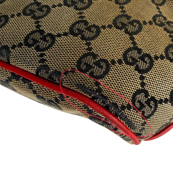 Authentic Gucci Brown / Red Monogram GG Canvas Pochette Boat 