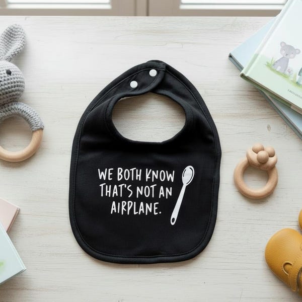 We Both Know That's Not An Airplane Unisex Baby Bib - Funny Baby Bib, Baby Shower Gift, Baby Feeding Humor