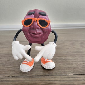 Vintage Rubber Bendable California Raisin