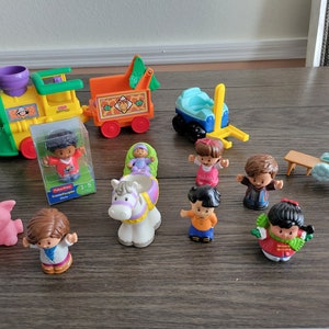 Vintage Set of Little People, 14 pieces marked Fisher Price Mattel