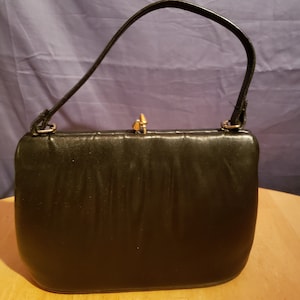 Monedero vintage Etra negro con asa