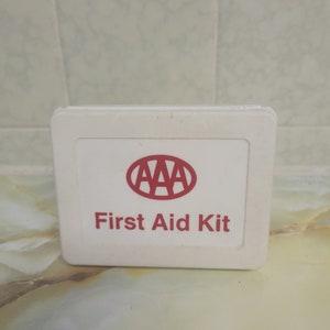 Vintage Plastic AAA First Aid Kit