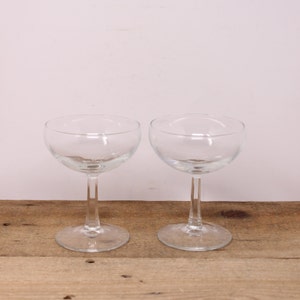 2 Champagne Coupes / Glasses with Faceted Stems