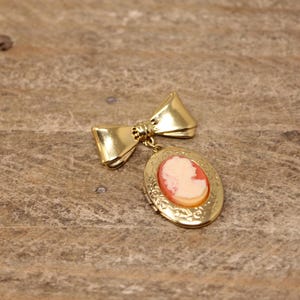 Vintage Victorian Style Gold Tone Cameo Locket - Brooch Pin  with Decorative Ribbon