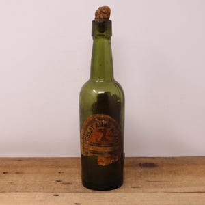 Antique Great Auks Head Green Glass Beer Bottle