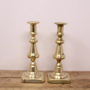 Set of Brass Candlestick Holders with a Square Base