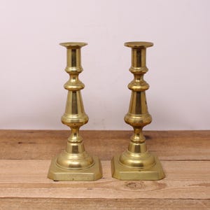 Set of Brass Candlestick Holders with a Square Base