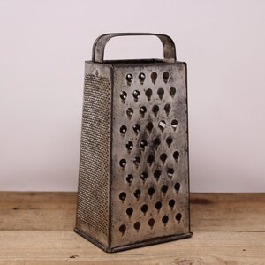 5-Minute DIY: Turn a Cheese Grater Into an Earring Caddy - Brit + Co