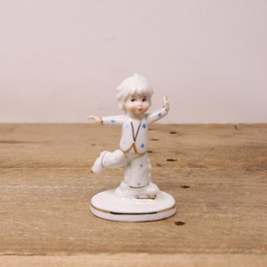 Vintage Porcelain Girl Figure Skating Figurine