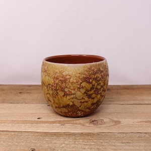 May include: A handmade wooden sign with the text "Welcome to our home" in a handwritten style. The sign is painted white with black lettering and a distressed finish, ideal for farmhouse decor.