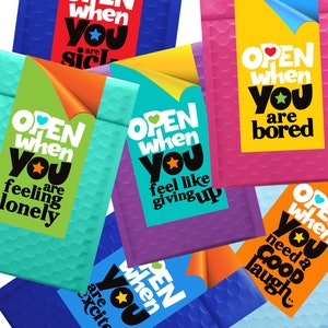 May include: Six colorful bubble mailers with the text "OPEN WHEN YOU" followed by a reason to open the mailer. The mailers are blue, turquoise, purple, pink, orange, and light blue.