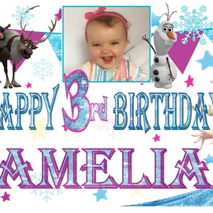 May include: A Frozen-themed birthday banner with a photo of a young girl in a pink bow, the text "Happy 3rd Birthday Amelia", and images of Elsa, Anna, Olaf, and Sven.