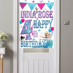 May include: A Frozen-themed birthday banner with a blue and white glitter number 4, the words "India Rose 4th Happy Birthday", and a picture of Elsa from Frozen.