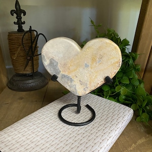 Pink Amethyst Crystal heart on black display stand