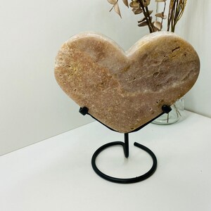 Pink Amethyst Crystal heart on black display stand