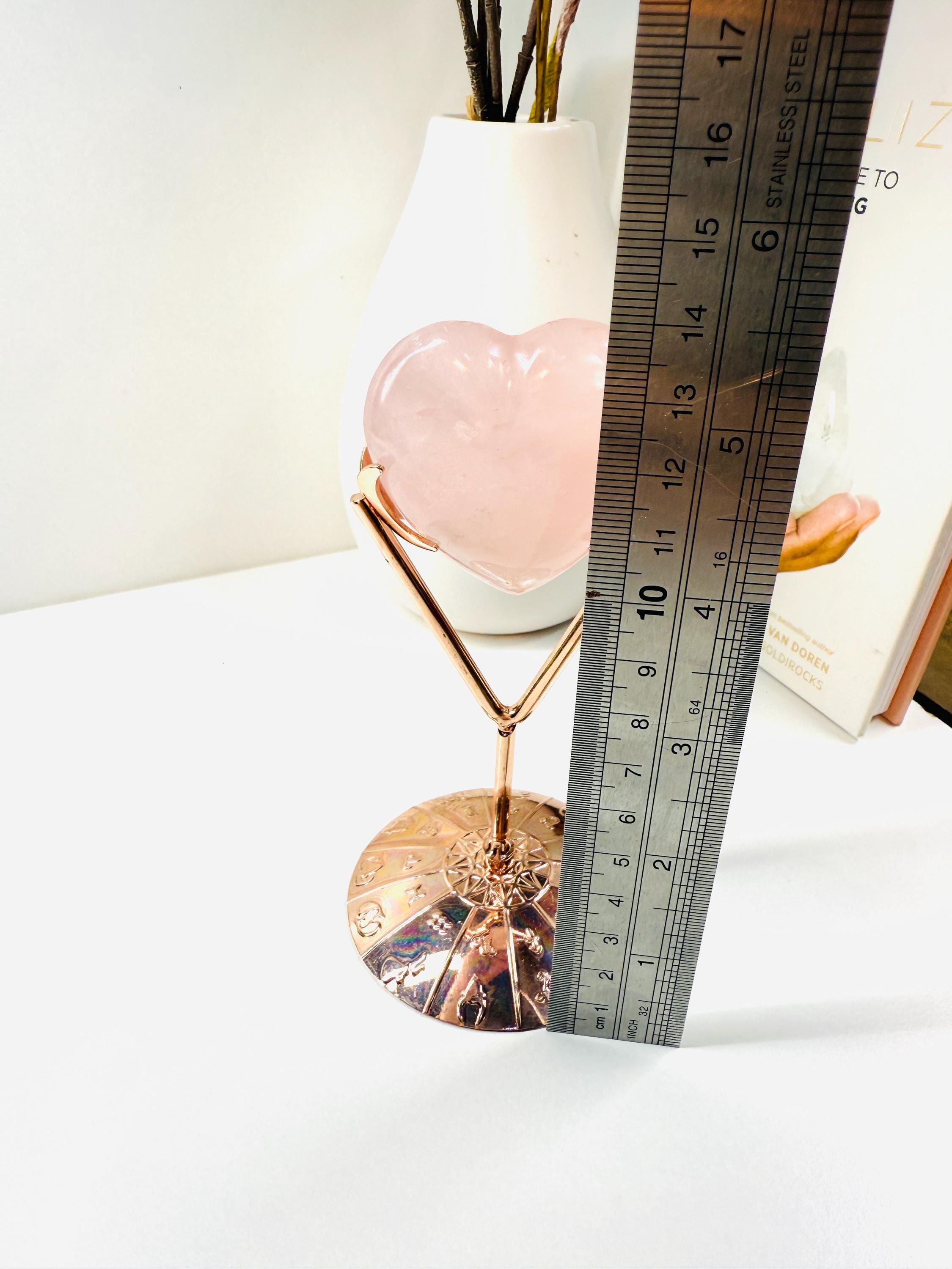 Polished Rose Quartz Love Heart on Rose Colored Metal Stand With