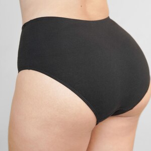 May include: Black high-waisted underwear with a smooth, seamless design.