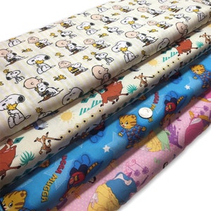 Peanuts Lion King Fabric By the Yard FBTY Fat quarters FQ Half Many Patterns available 100% Cotton Snoopy Disney Princess Daniel Tiger