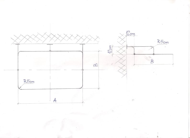 Puede incluir: Un diagrama dibujado a mano de una forma rectangular con esquinas redondeadas. La forma tiene 12 cm de ancho y 12 cm de alto. El diagrama incluye medidas para las esquinas redondeadas, que son R5 cm.