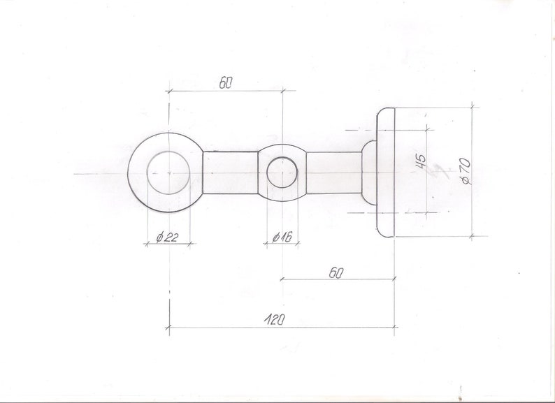 May include: A black and white line drawing of a metal eye bolt with dimensions labeled in millimeters. The eye bolt has a diameter of 22 mm, a length of 60 mm, and a width of 70 mm. The eye bolt has a round eye with a diameter of 16 mm.