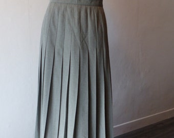 1960s . Pleated skirt. T 48.Too classy, Margaret