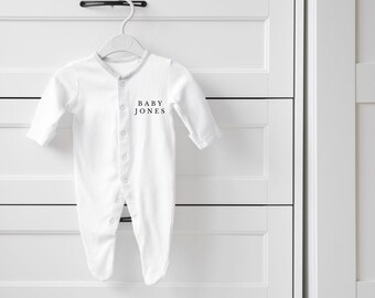 personalised baby sleep suit (baby & surname spaced)