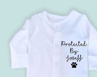 Protected by dog sibling, adorable sleep suit that will be a keep sake forever. Perfect baby gift or for parents to be.