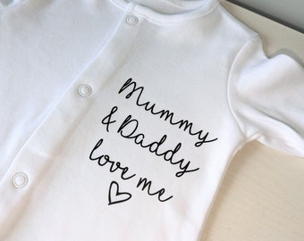 Mummy & Daddy love me baby sleep suit with heart, unisex personalised gift.