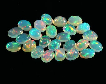 Cabochão de Opala de Fogo Welo Etíope Natural AAA+++, 7 x 5 mm, Formato Oval, Multicolorido, 25 peças. Ideal para fabricação de joias. #C3