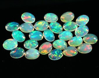 Cabochão de Opala de Fogo Welo Etíope Natural AAA+++, 7 x 5 mm, Formato Oval, Multicolorido, 25 peças. Ideal para fabricação de joias. #C4