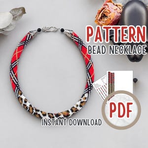 May include: A beaded necklace featuring a red, black, and white plaid pattern that transitions into a brown, black, and white leopard print design. The necklace includes a silver-toned clasp and is accompanied by a PDF pattern document.