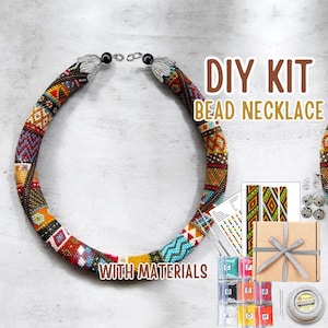 May include: A colorful beaded necklace with a geometric pattern, displayed with a DIY kit. The kit includes beads, thread, and instructions. Text on the image reads "DIY KIT BEAD NECKLACE WITH MATERIALS."