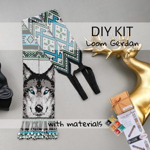 May include: DIY kit for making a beaded wolf loom necklace. The kit includes beads, thread, and instructions. The finished necklace features a wolf's face with blue eyes and a geometric pattern.