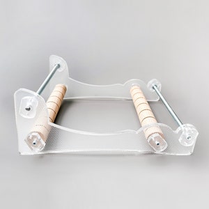 Turn your creative ideas into reality with this DIY Loom. Perfect for both beginners and experts, this upright plastic loom lets you weave intricate bead patterns and make your own jewelry. Discover the joy of bead crafting with this complete kit!