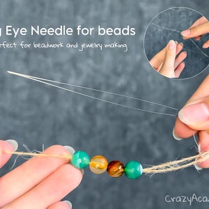 May include: Close-up of a big eye needle threading beads. The image shows a needle with a fine, flexible wire, perfect for beadwork and jewelry making. The text in the image says "Big Eye Needle for beads perfect for beadwork and jewelry making."